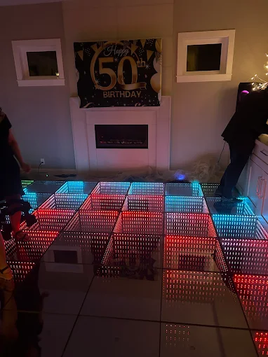 Colourful infinity LED floor panels at a birthday celebration